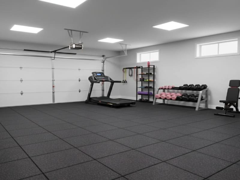 A side-by-side comparison of rubber flooring, epoxy, and plastic garage tiles.